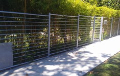 Before Exterior Fence & Gates Conversion to Glass & Metal Fence and Gate 